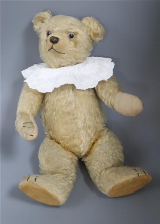 An early English bear 1930s, 17in., replaced paw pads, general thinning to mohair, glass eyes